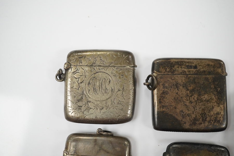 Five assorted late 19th/early 20th century silver vesta cases, largest 58mm. Condition - poor to fair